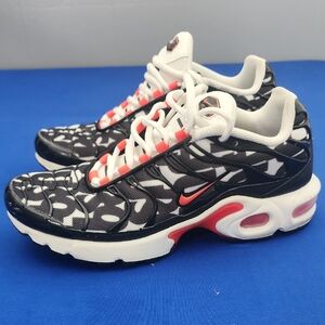Nike Black and White Sneakers with Red Highlights